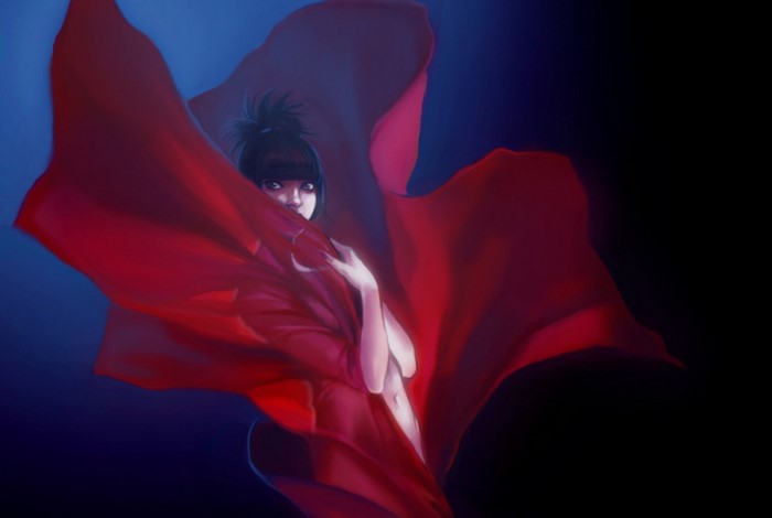 Woman in red fabric against blue and black background
