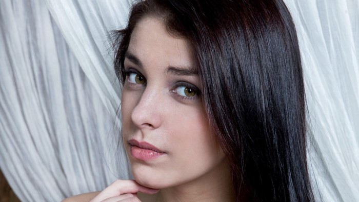 Evita Lima portrait with long black hair