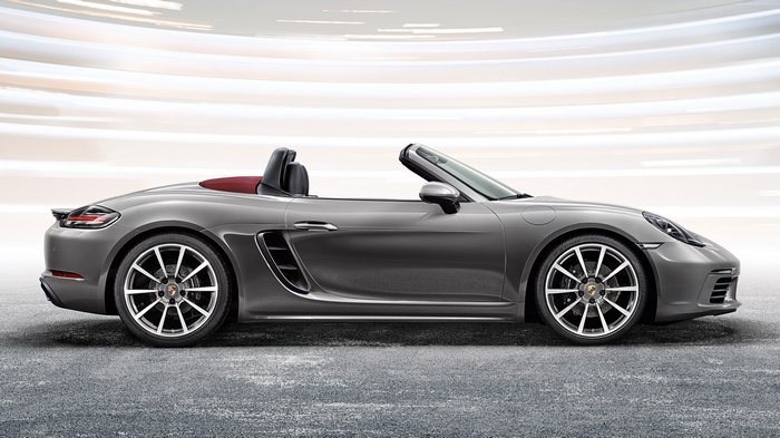 Grey Porsche 718 Boxster convertible sports car