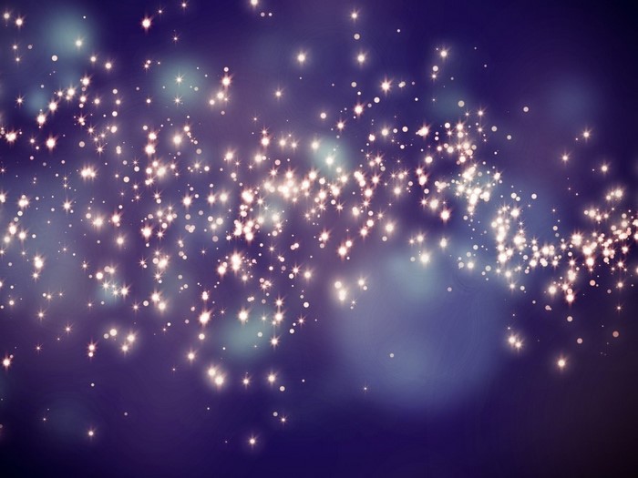 Sparkling lights and bokeh effect on a dark background