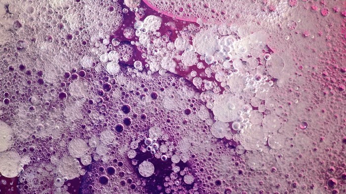 Purple and pink bubbles macro photography texture