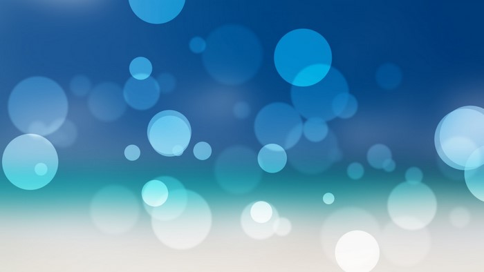 Abstract blue and teal bokeh circles