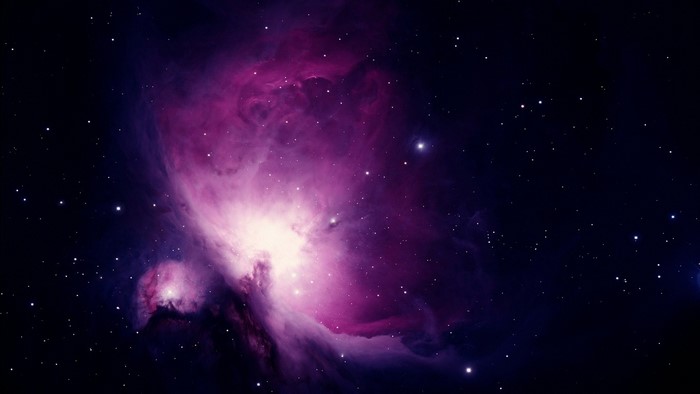 Purple and white nebula in outer space with stars
