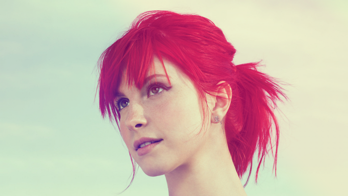 Close-up Portrait of Woman with Vibrant Red Hair