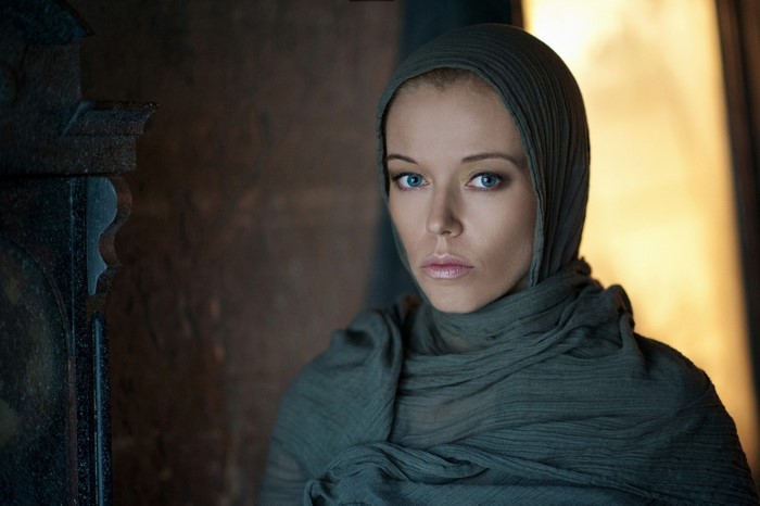 Woman with blue eyes wearing a headscarf