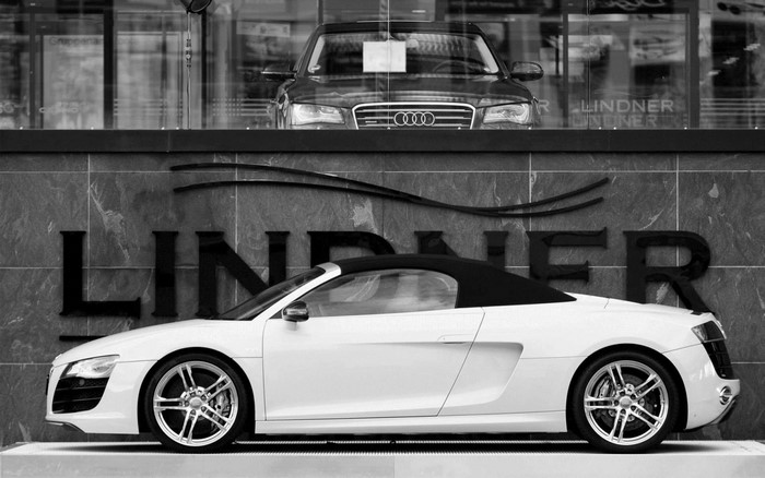 White Audi R8 Spyder in front of Lindner dealership