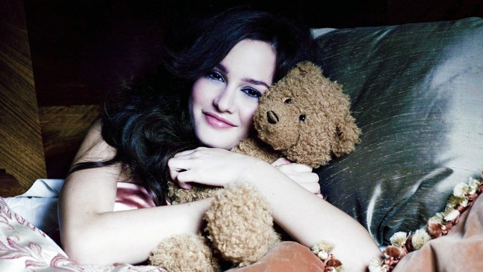 Leighton Meester hugging a teddy bear