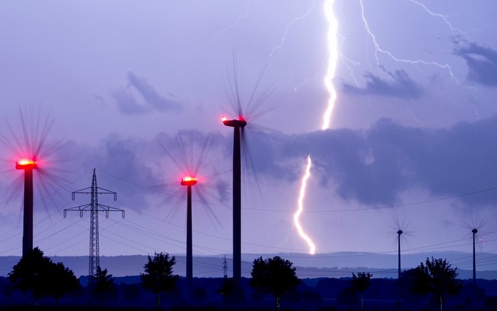 Wind turbines and lightning during a storm