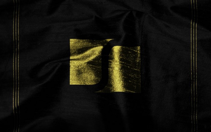 Black fabric with gold Serpentis logo from EVE Online