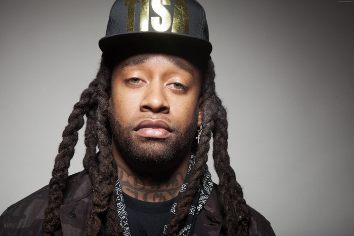 Ty Dolla Sign wearing a black hat and bandana