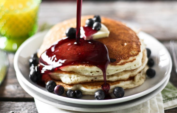 Pancakes with blueberries and syrup