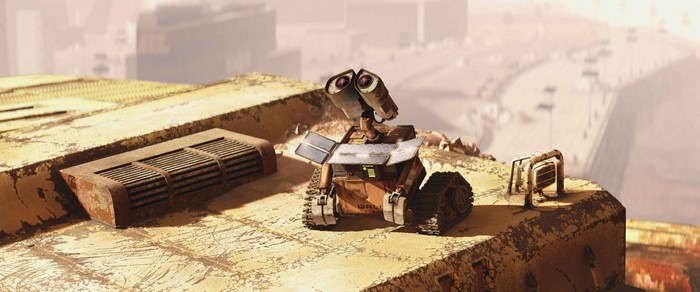 WALL-E robot on a rusty rooftop overlooking a city