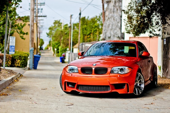 Orange BMW sports car parked on a street