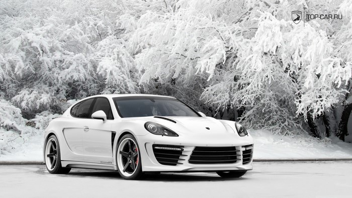 White Porsche Panamera GTS in snowy forest