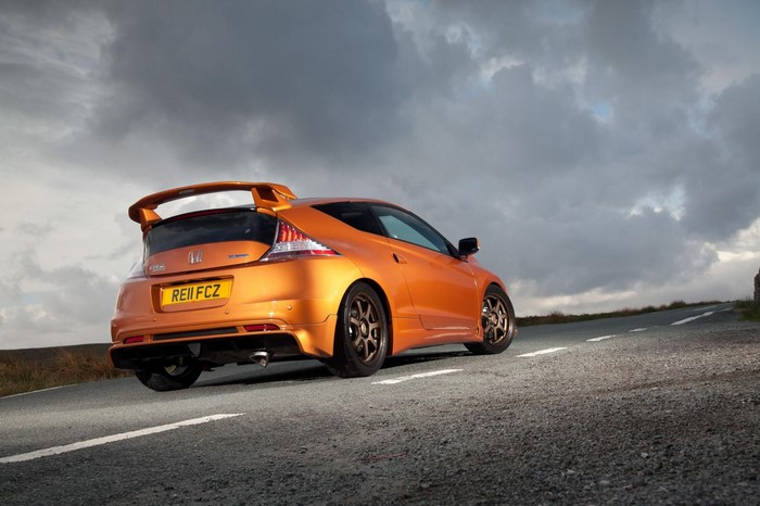 Orange Honda CR-Z sports car on a road