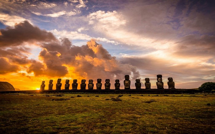 Moai statues on Easter Island at sunset