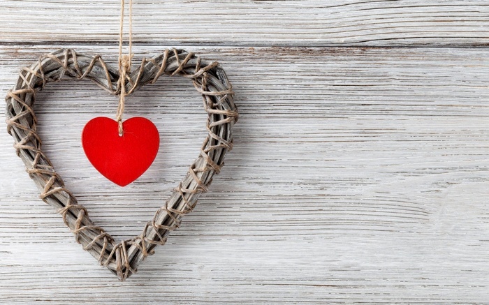 Woven heart decoration with red heart