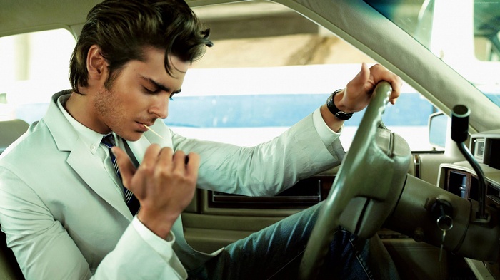 Zac Efron in a car