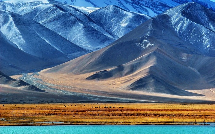 Snowy mountains and a lake in Tajikistan