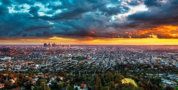 Los Angeles cityscape at sunset with dramatic clouds