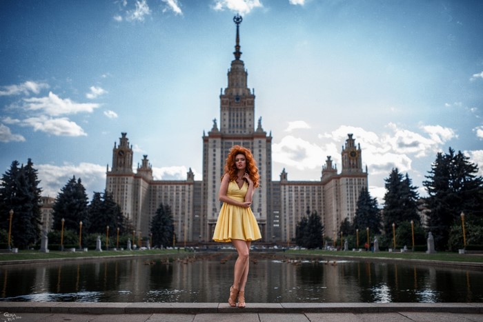 Woman in yellow dress in front of Moscow State University