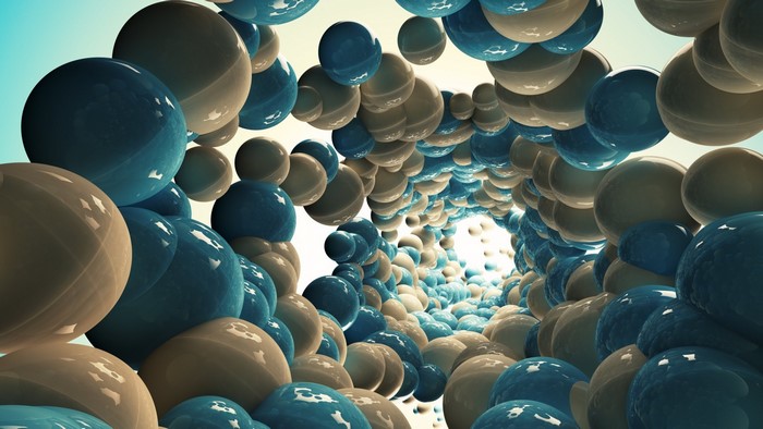 Abstract tunnel of blue and tan spheres