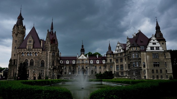 Mysterious Gothic Castle in Poland Under Cloudy Sky