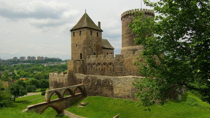 Castle with towers and arched bridge in Poland
