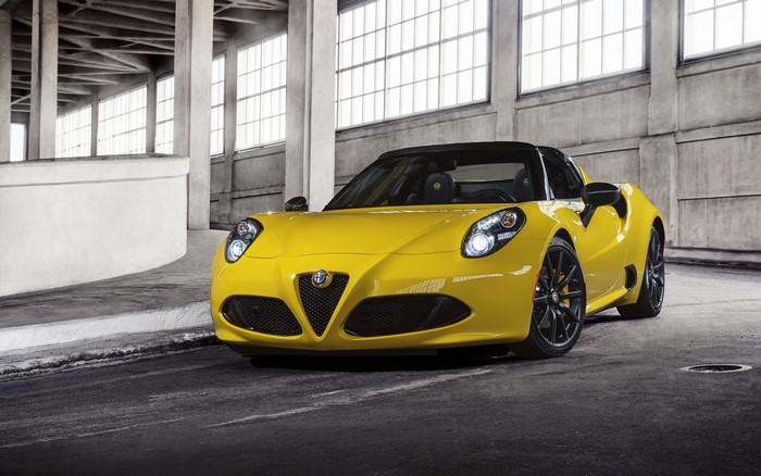 Yellow Alfa Romeo 4C Spider convertible sports car