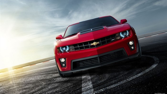 Red Chevrolet Camaro ZL1 on a Racetrack