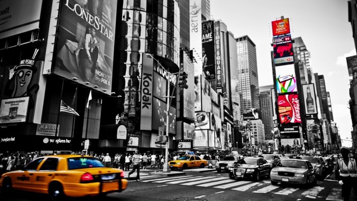 Times Square New York City with Yellow Taxis and Billboards