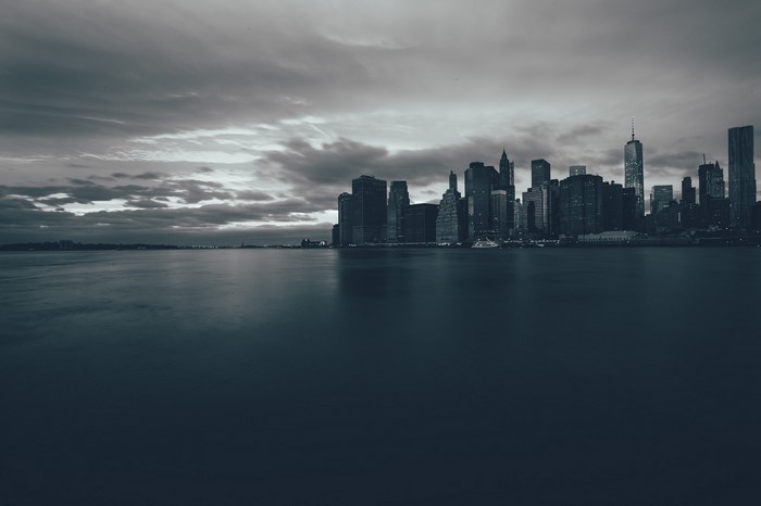 New York City skyline across the water at dusk