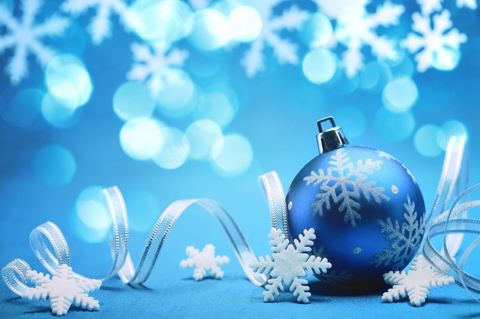 Blue Christmas ornament with snowflakes and ribbon