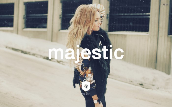Woman in winter fashion with text 'majestic'