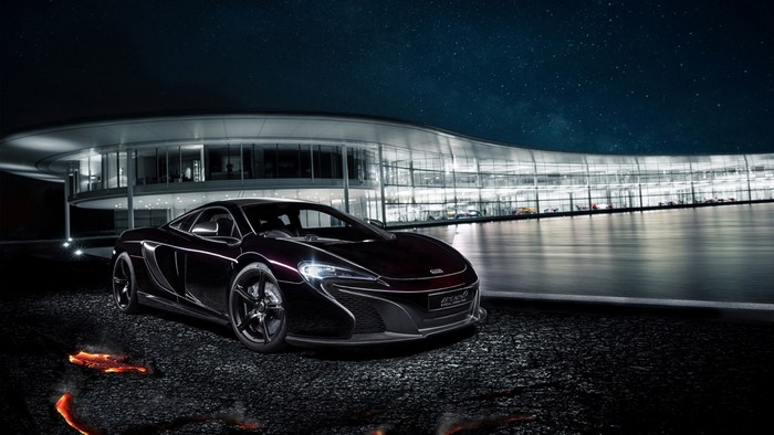McLaren 650S sports car in front of McLaren Technology Centre
