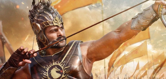 Baahubali aiming a bow and arrow