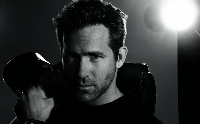 Ryan Reynolds holding a kettlebell