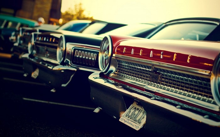 Close-up of vintage cars parked in a row