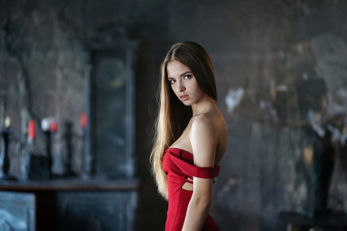 Woman in red dress by Victoria Lukina