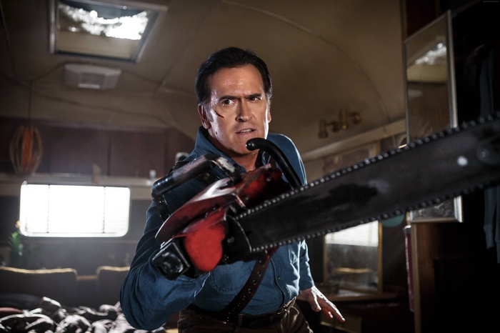 Ash from Ash vs Evil Dead holding a chainsaw