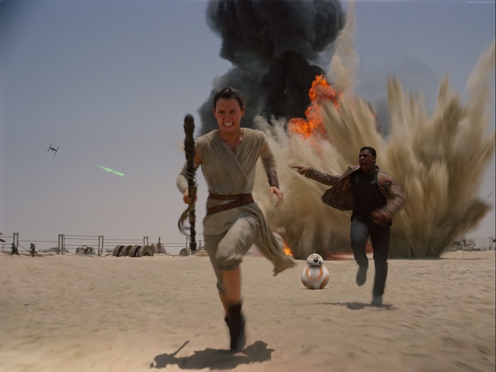 Rey and Finn running from explosion in Star Wars