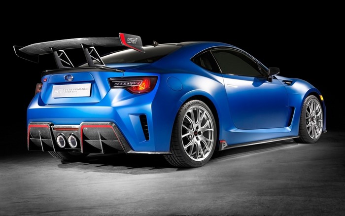 Blue Subaru STI Performance Concept car with large rear spoiler