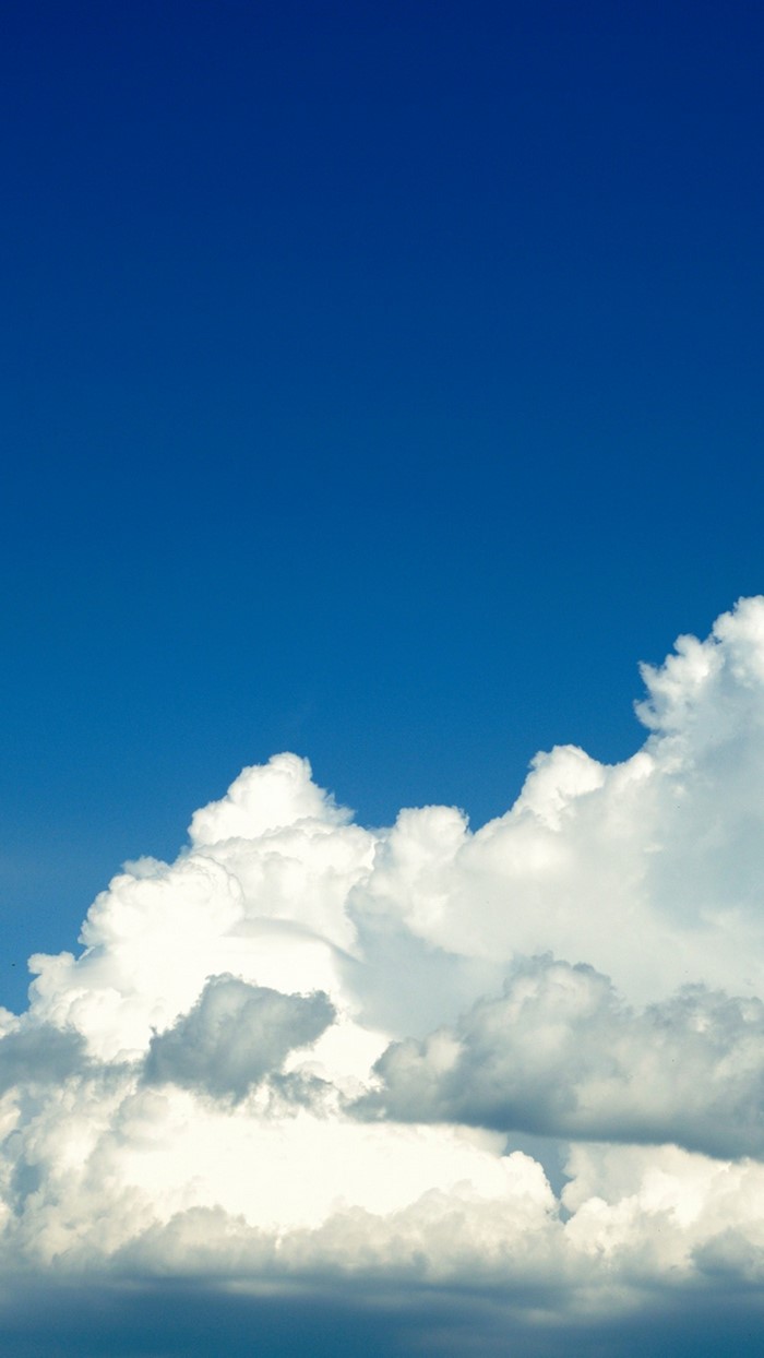Blue sky with cumulus clouds