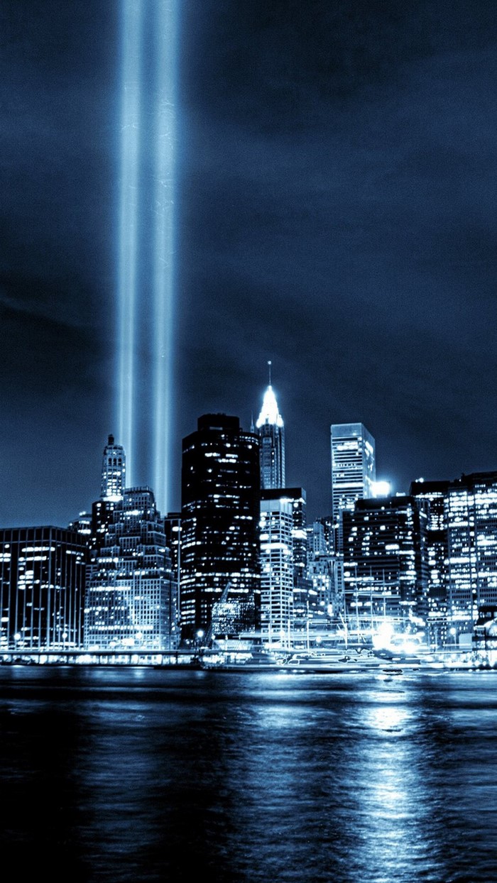 Tribute in Light over New York City skyline at night