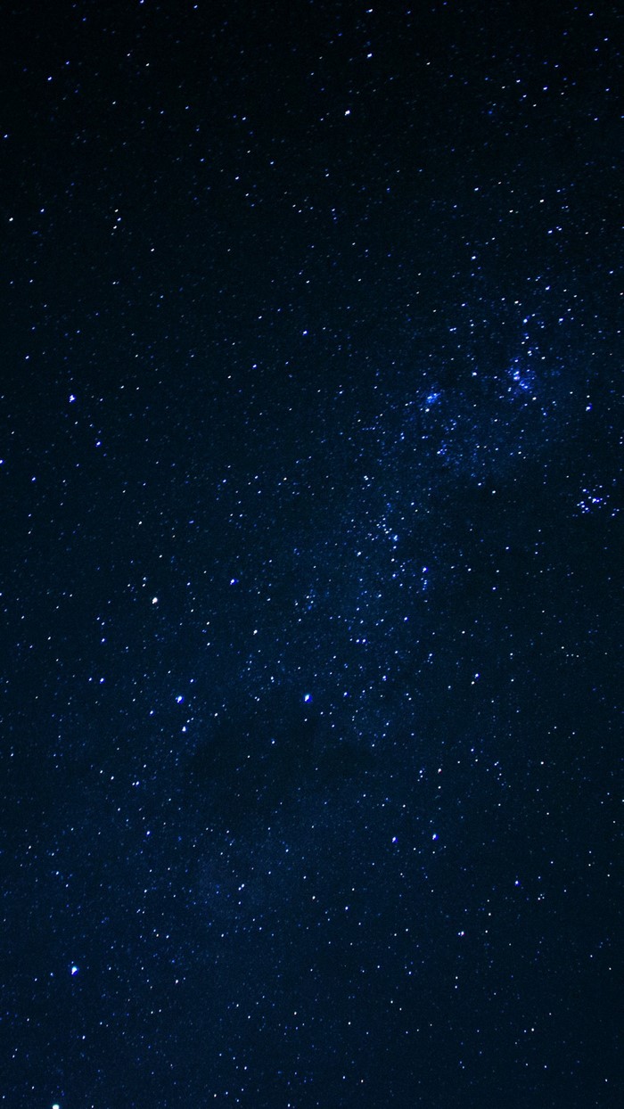 A dark night sky filled with countless stars