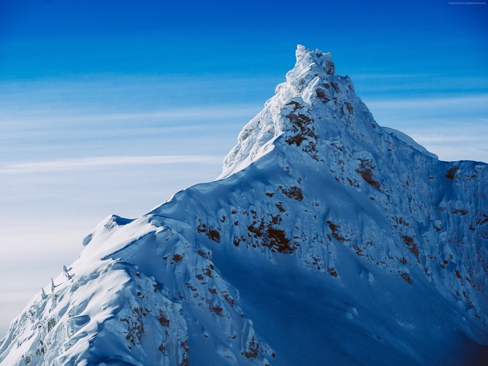 Snow-covered mountain peak in New Zealand