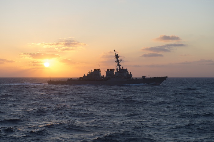 USS Laboon (DDG-58) destroyer sailing at sunset