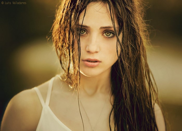 Portrait of a young woman with wet hair