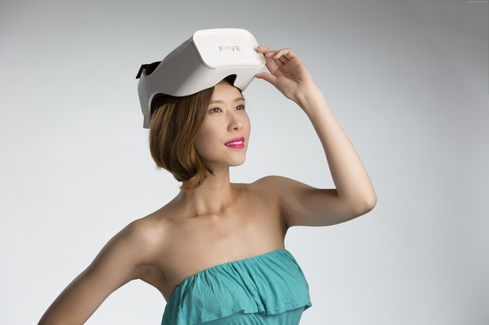 Woman wearing Fove headset VR