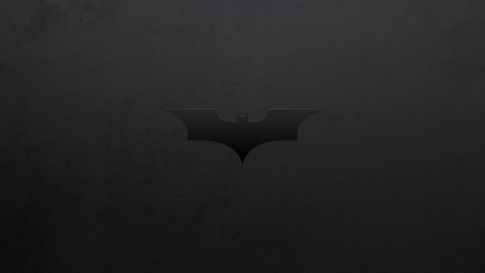 Batman logo on a dark textured background